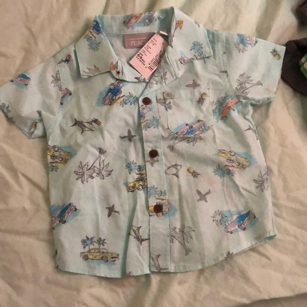 Infant children place shirt
